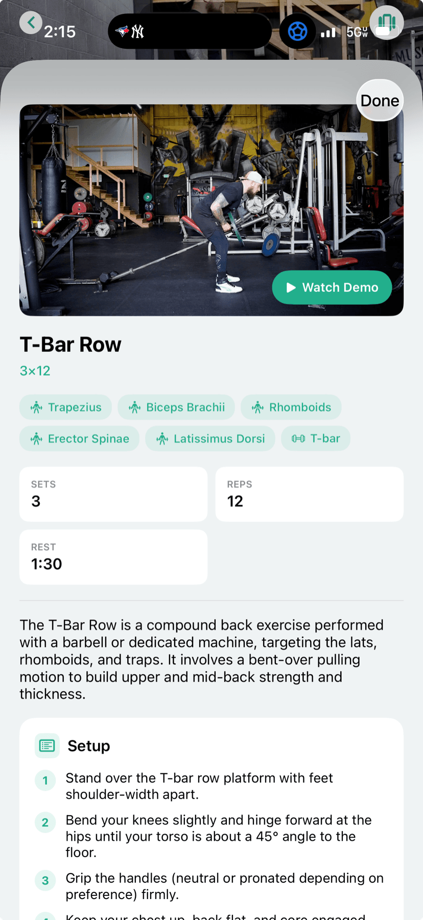 FitnessLink exercise detail screen for the T-Bar Row showing muscles targeted, sets, reps, rest, and setup instructions